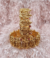 Micron Gold Plated Openable Kada Bangle With Wedding Motif Carvings, Encrusted With Synthetic Stones.