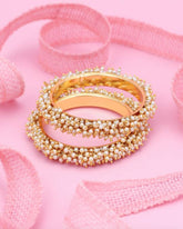 Gold Pearl Bangles.