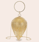 Rhinestone fringe decor clutch bag.