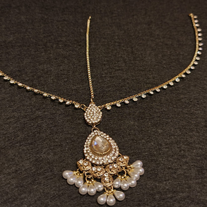 Beautiful indian traditional maang tikka with diamond cut stones and pearls