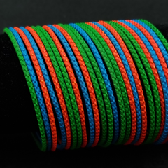 Multi coloured metal bangle set.