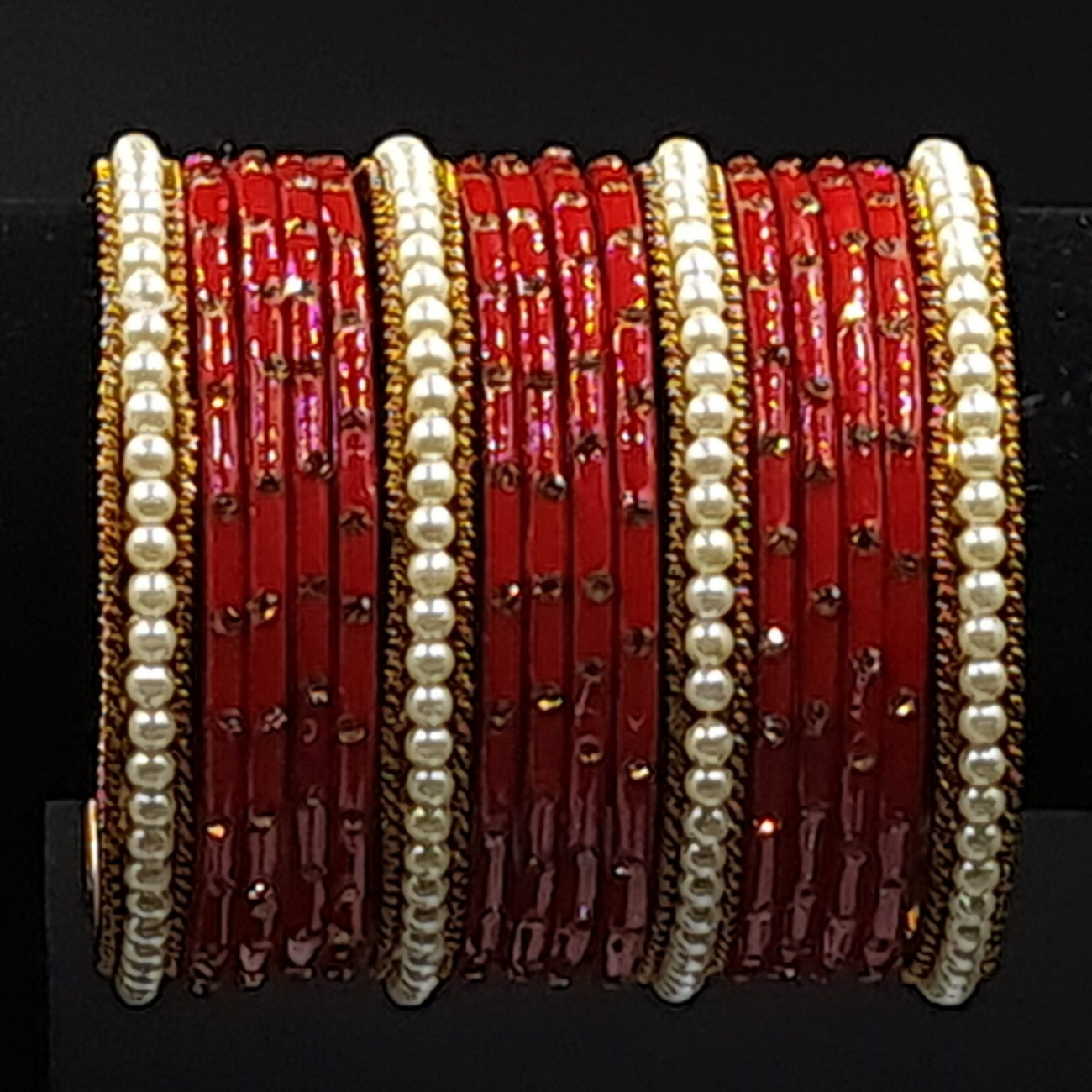 Traditional ethnic red bangles designed with pearl golden kangan