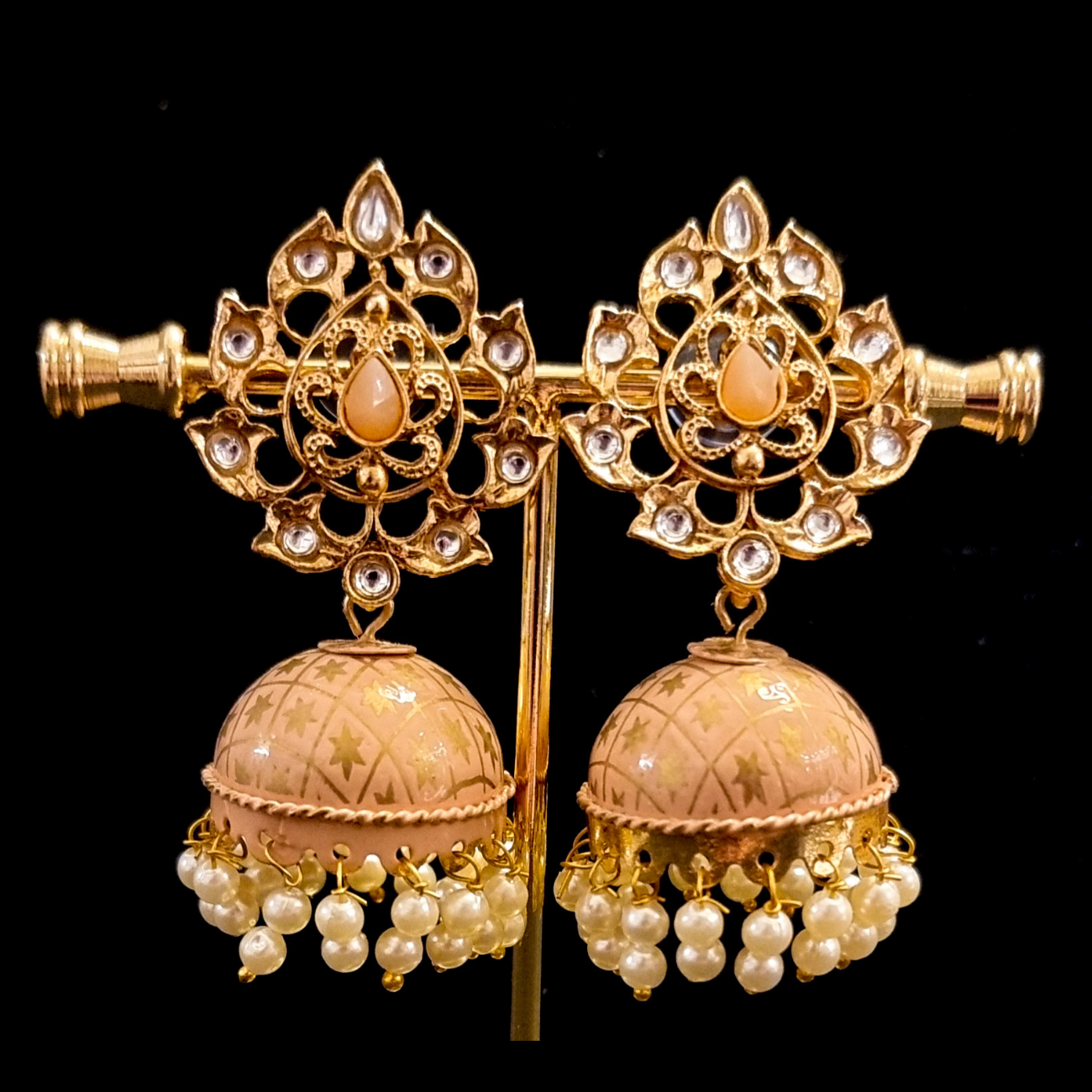 Hand crafted meenakari kundan jhumkas. Hand crafted meenakari kundan jhumkas.