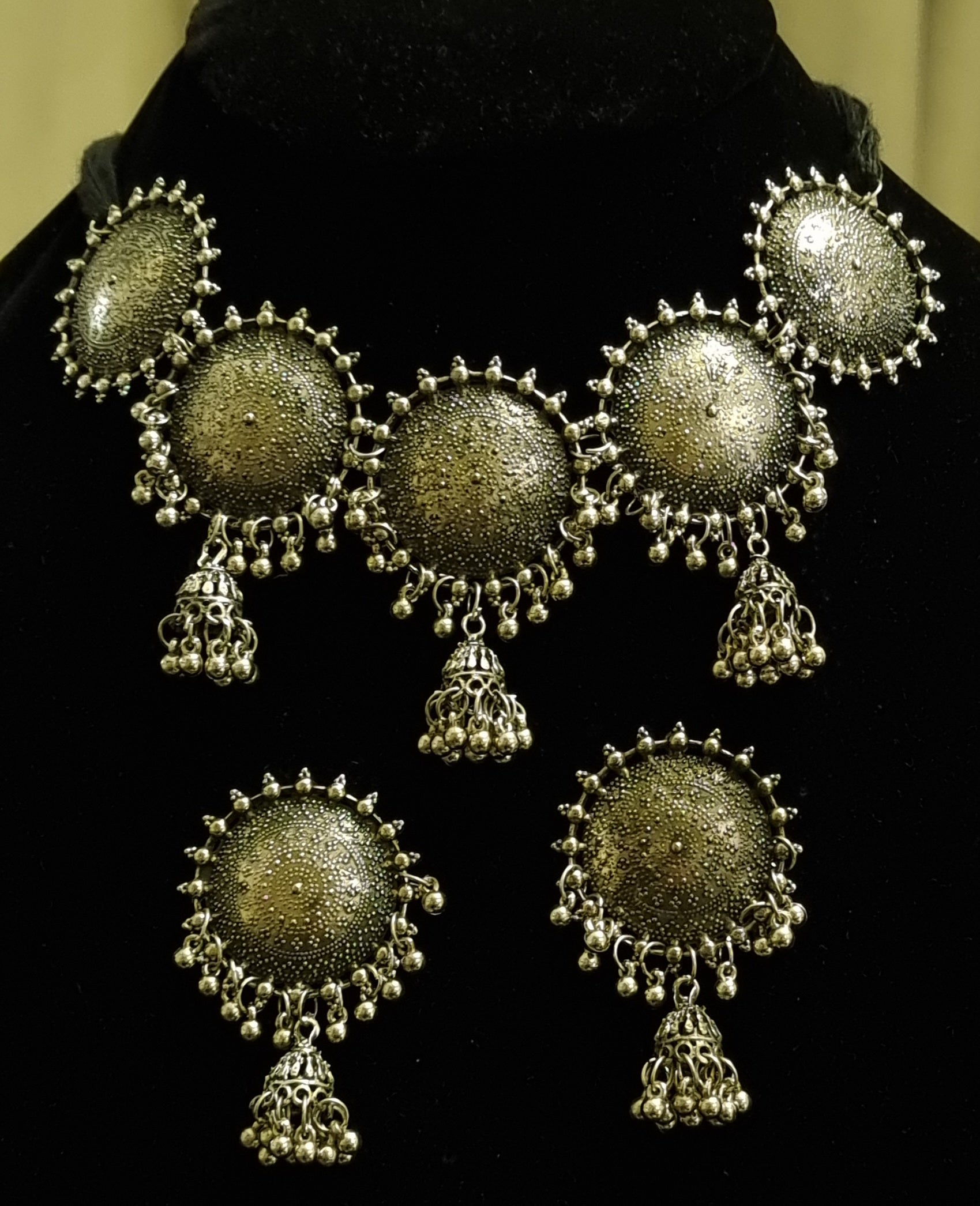 Round oxidized silver ethnic choker with earrings. Round oxidized silver ethnic choker with earrings.