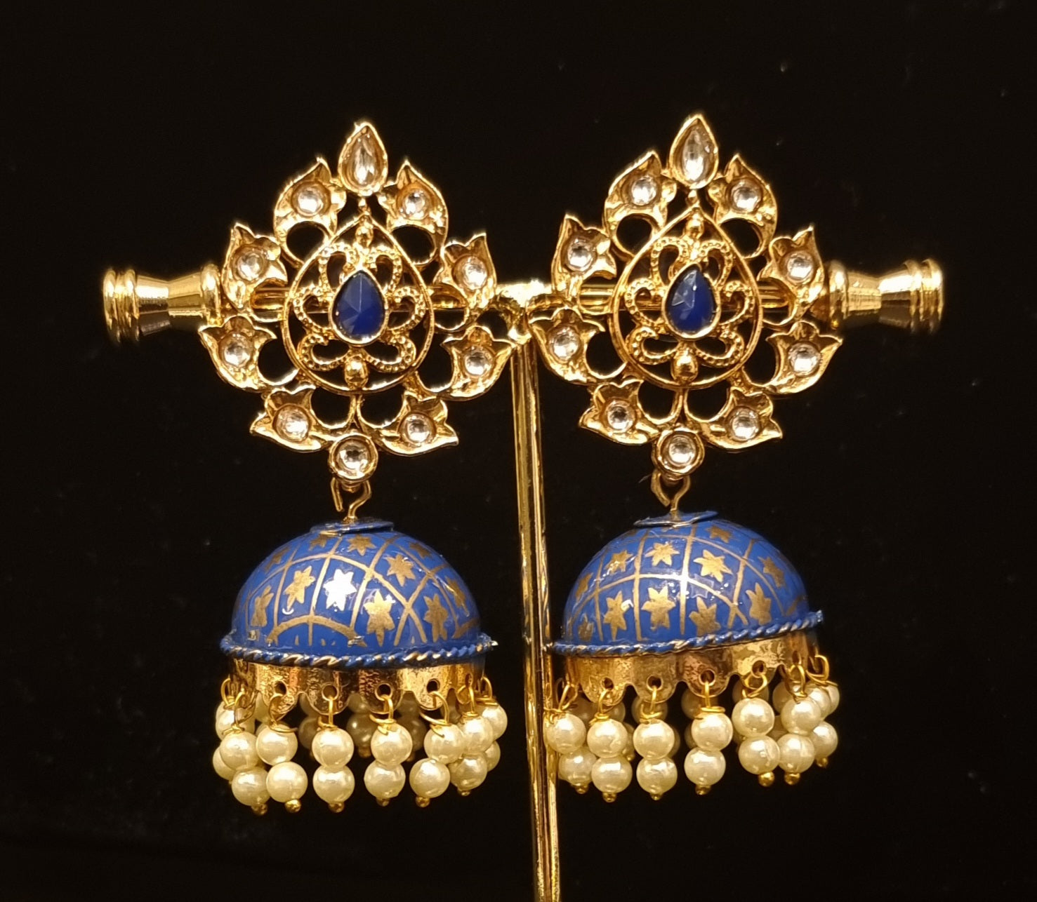 Hand crafted meenakari kundan jhumkas. Hand crafted meenakari kundan jhumkas.