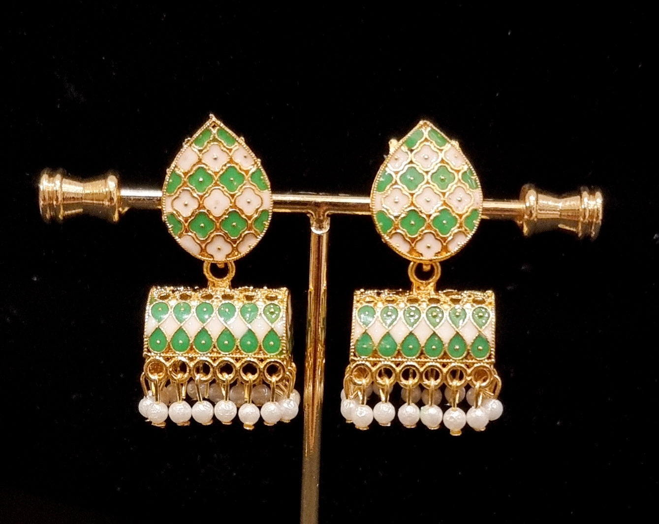 Traditional enamel paint jhumkis. Traditional enamel paint jhumkis.