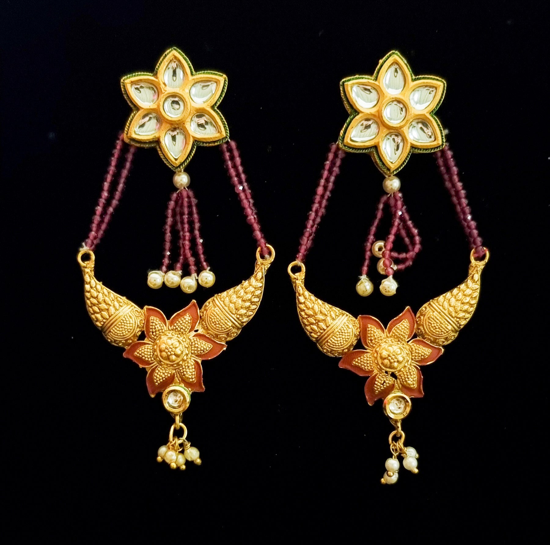 Kundan gold plated jhumar style earrings.