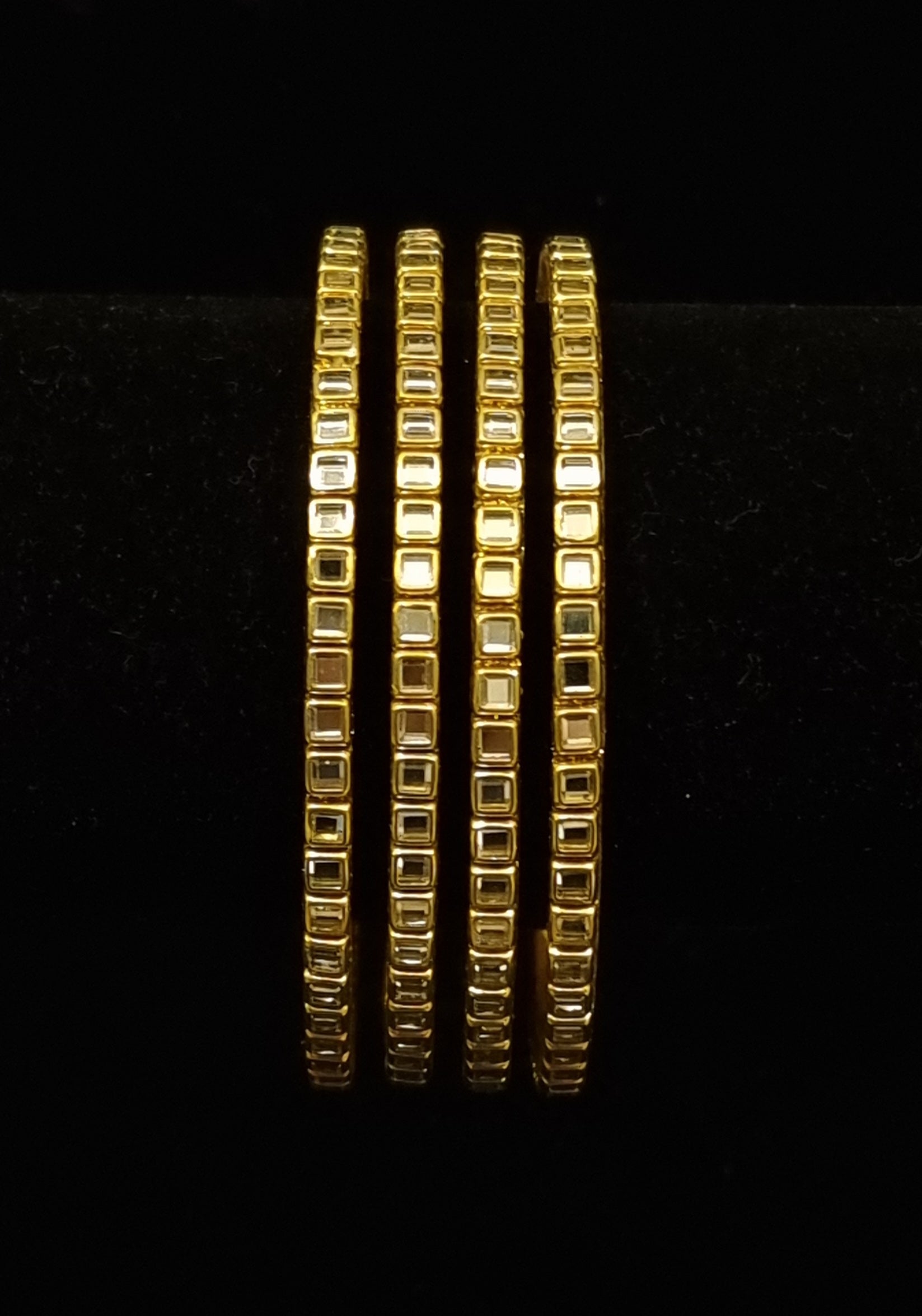 Brass kundan bangles. ( 4 bangles ) Brass kundan bangles. ( 4 bangles )