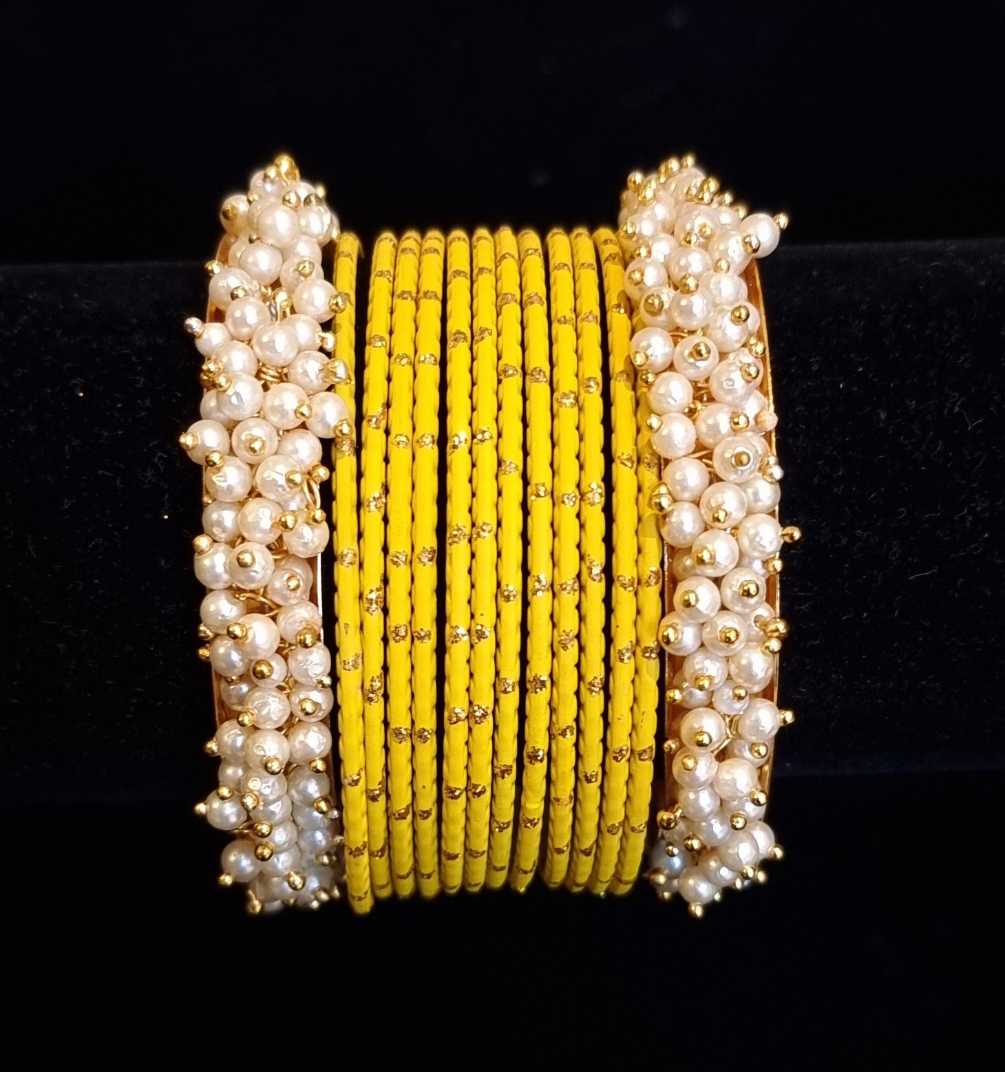 Pearl kadas with metal bangles set. Pearl kadas with metal bangles set.