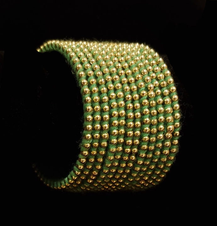 ( 2.8 ) Designer golden beads thread metal bangles.