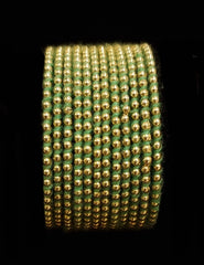 ( 2.8 ) Designer golden beads thread metal bangles.