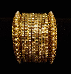 (2.4) Brass pearl kadas with brass kundan bangles.