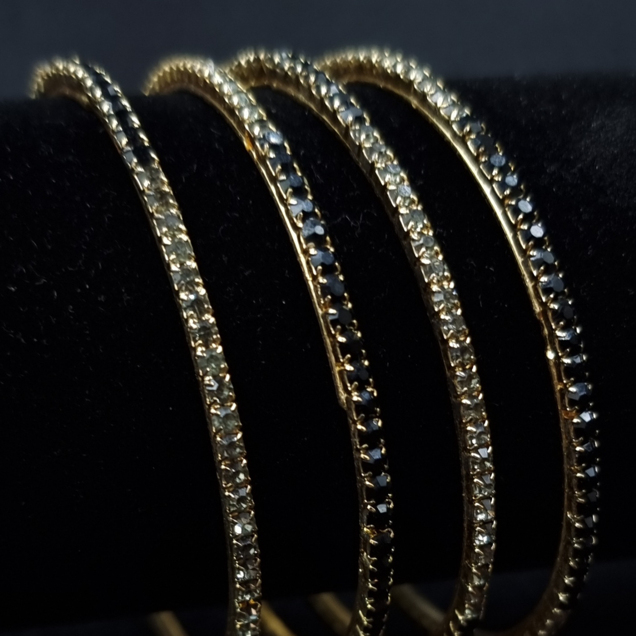 Designer rhinestone metal bangles.