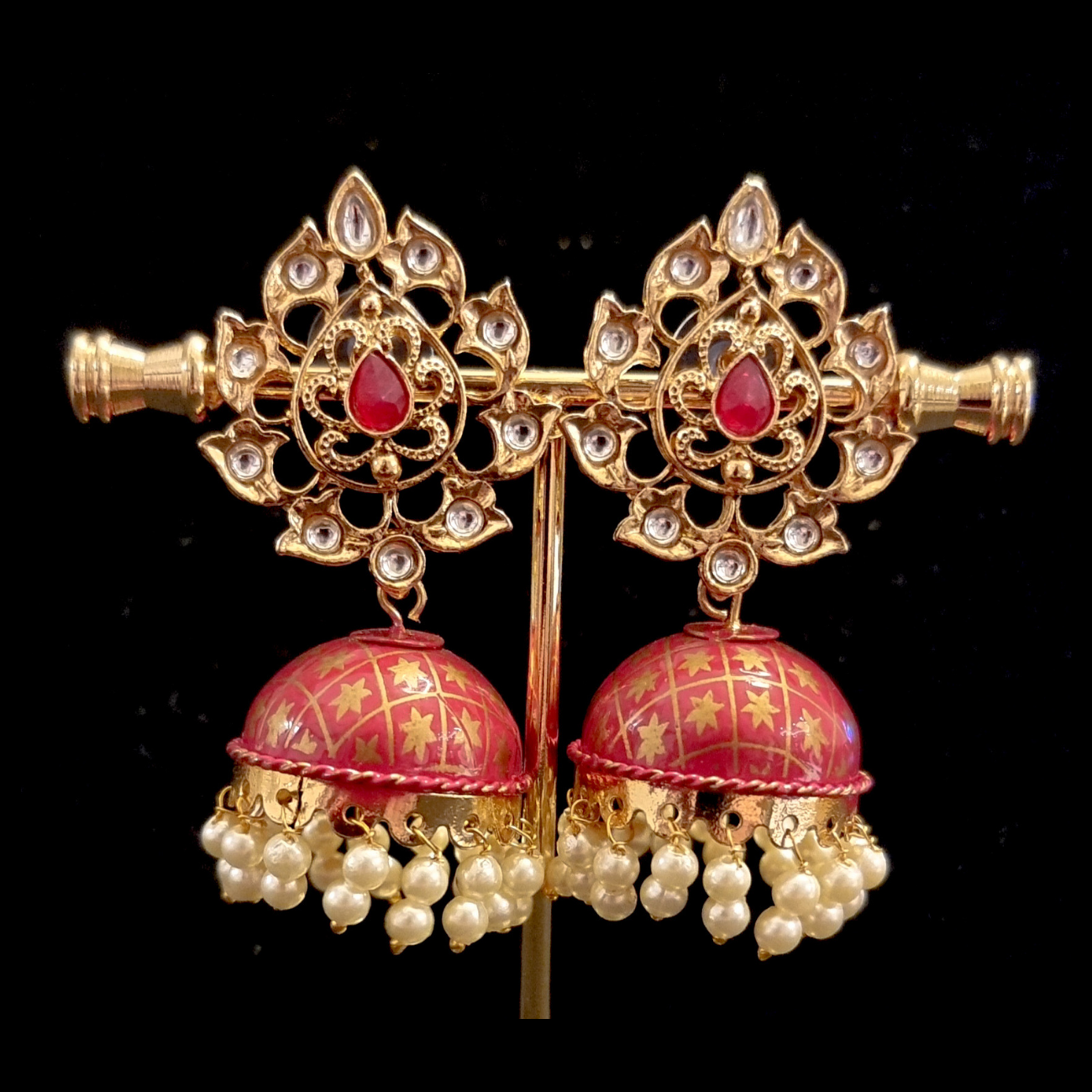 Hand crafted meenakari kundan jhumkas. Hand crafted meenakari kundan jhumkas.