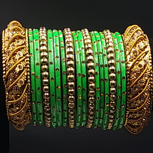 Beautiful combination of parrot green bangles with gold dot and rhine stone kadas