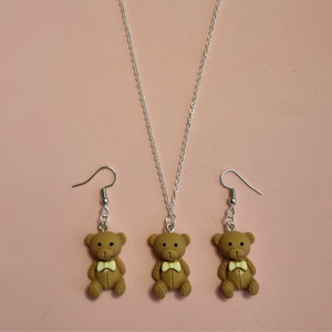 Bear pendant with earrings.