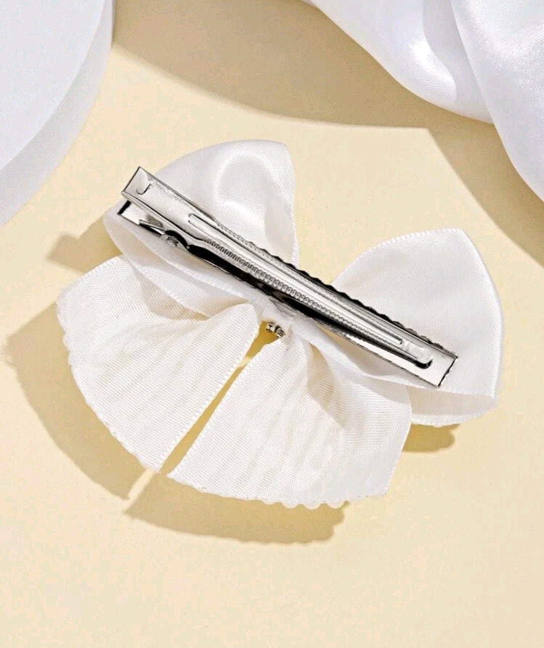 Faux Pearl Bow Hair Clip. Faux Pearl Bow Hair Clip.